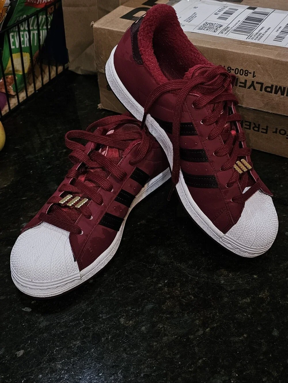adidas Red Shell Toe Sneakers with Black Stripes